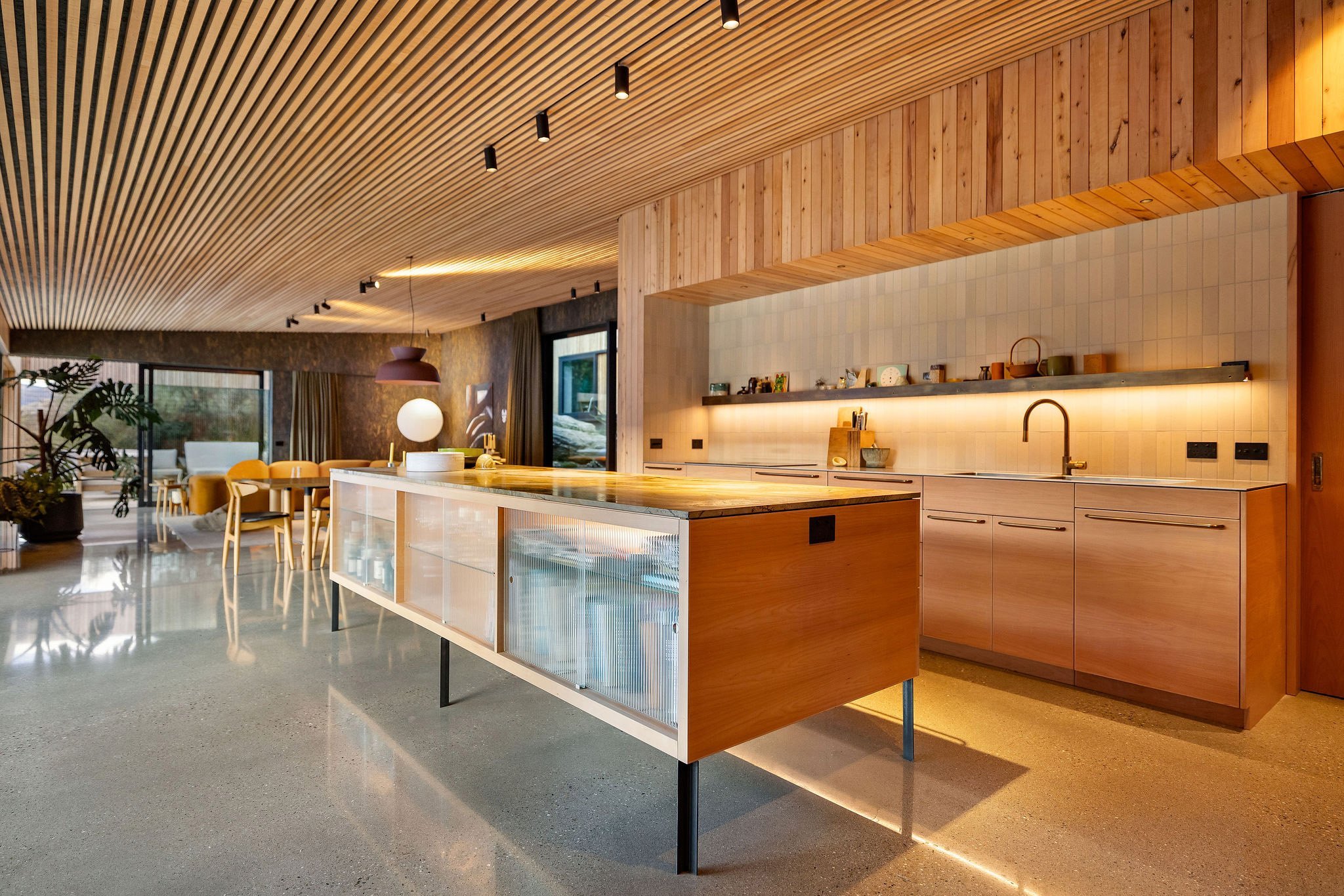 The kitchen is Southland beech veneer, to match the walls and ceilings throughout the house. The...