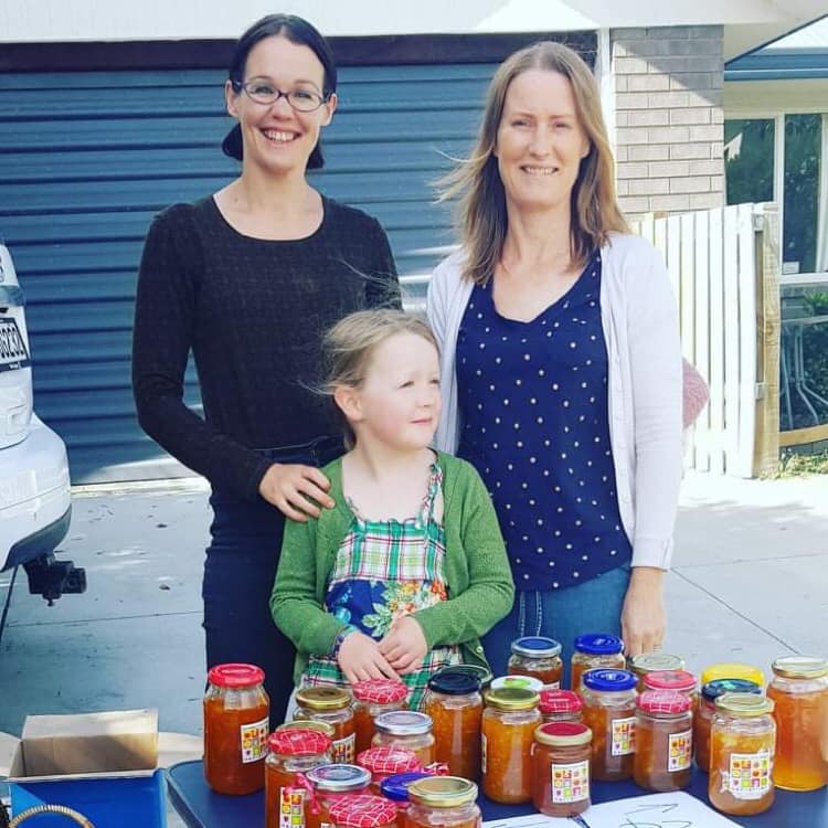 Amelia Knight-Baré (left), daughter Serena, and Paula Aitken from the Heathcote Valley Community...