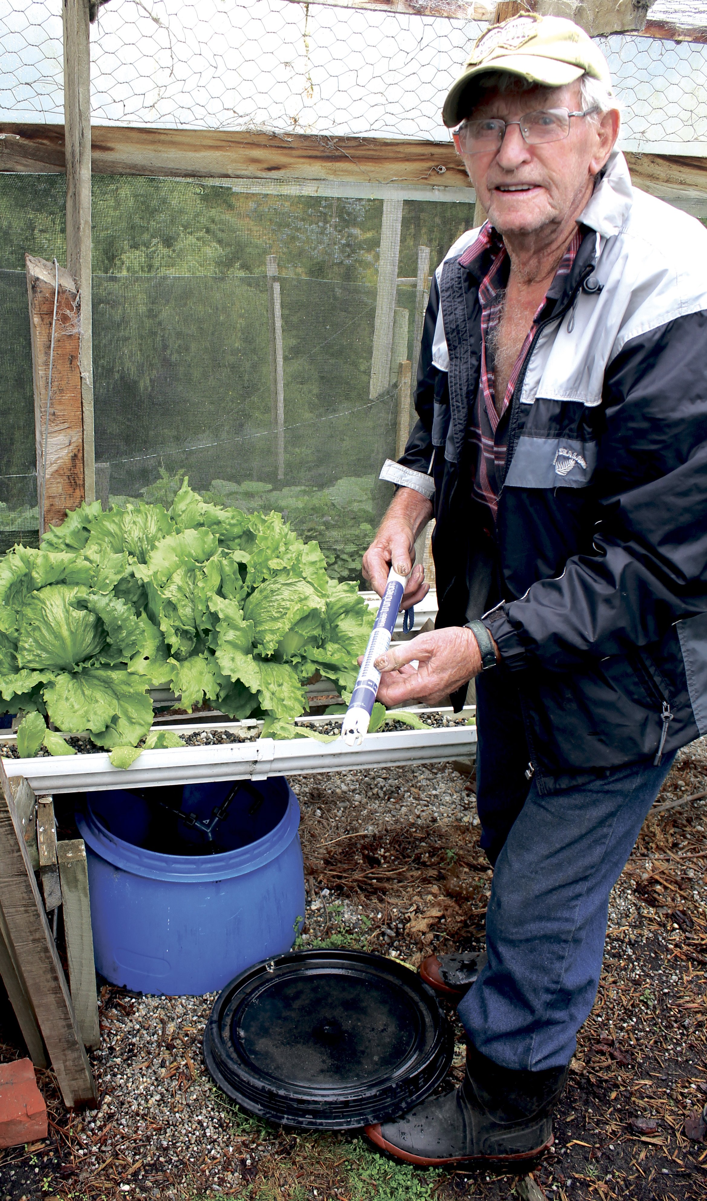 John Sadler takes a reading using a nutrient meter. Photo: supplied 