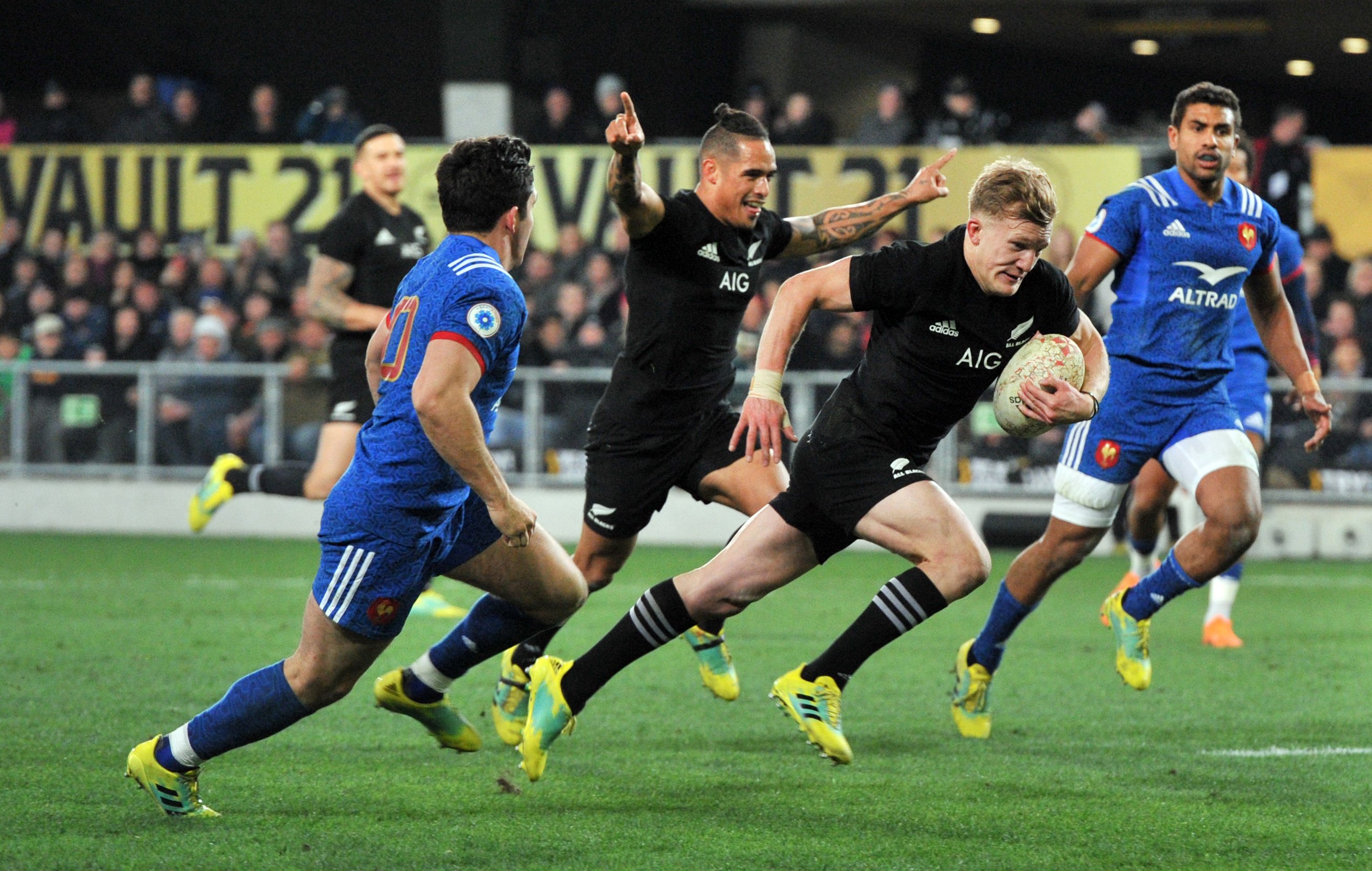 All Black first five Damian McKenzie heads for the tryline in the test against France in Dunedin...