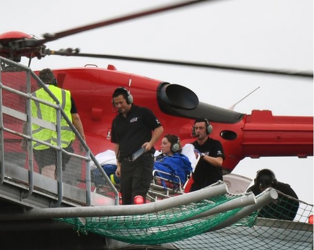 The woman was transferred from the Otago Regional Rescue helicopter to Dunedin Hospital after the...