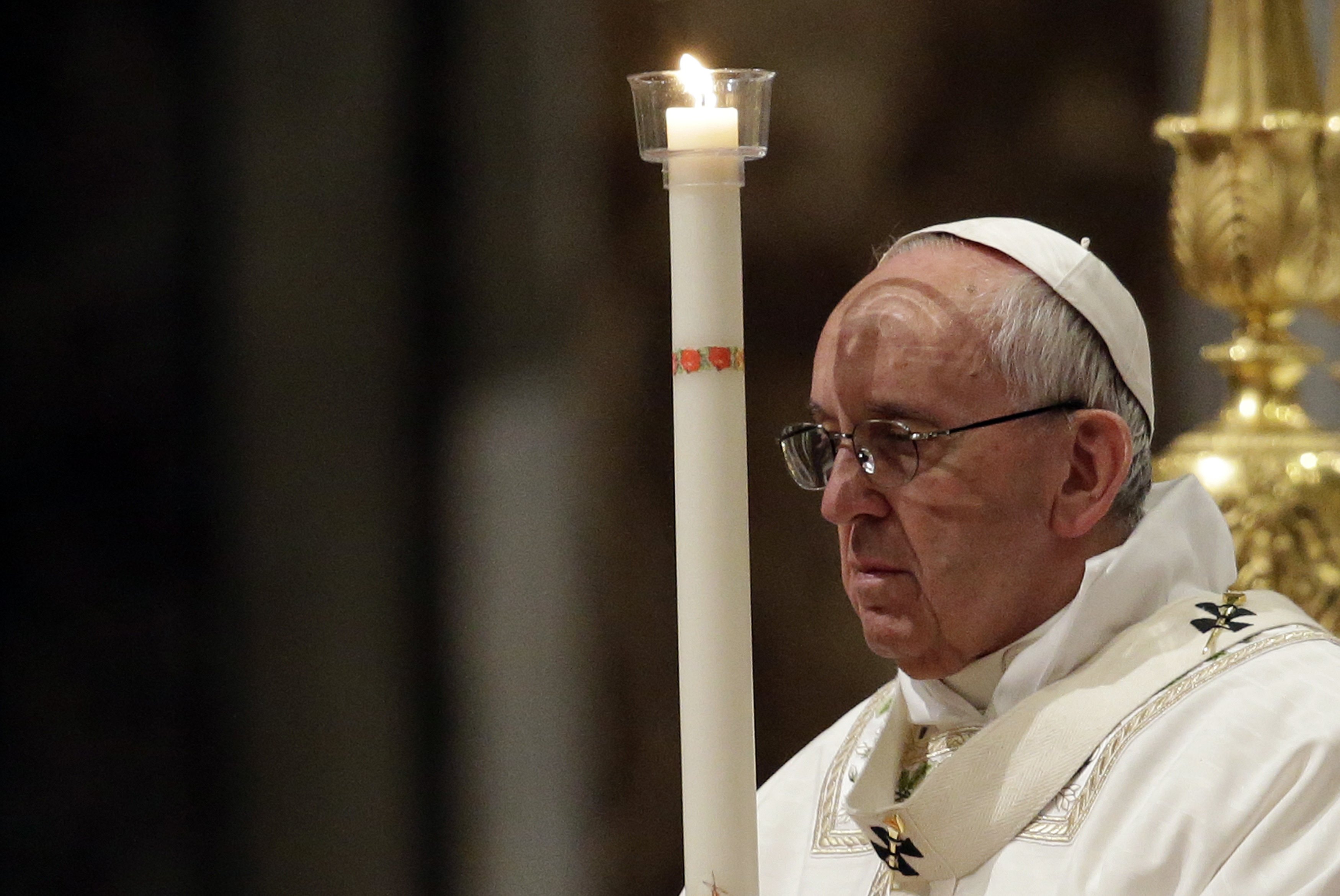 Pope Francis leads the Easter Vigil Mass in Saint Peter's Basilica. Photo: Reuters 