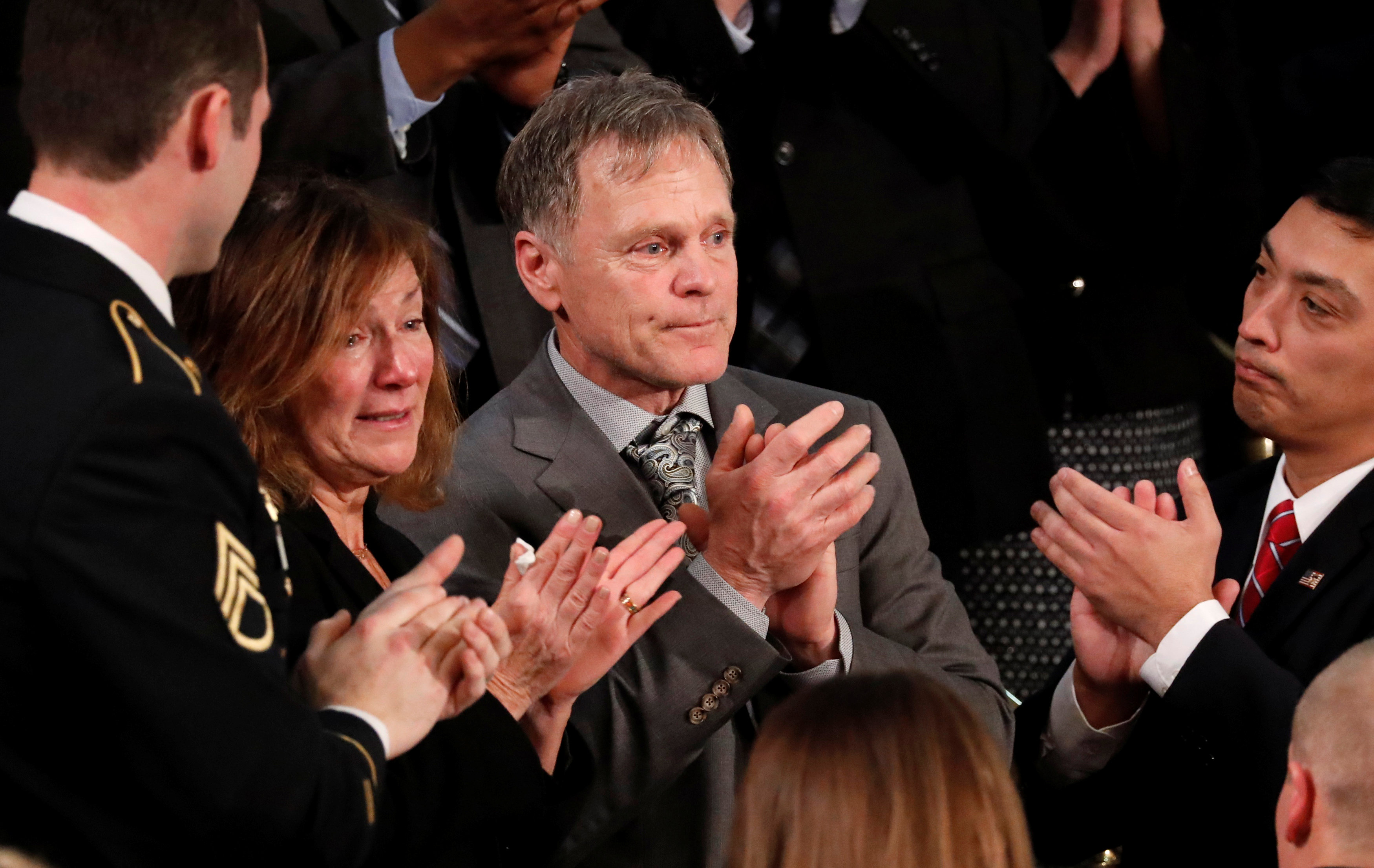 Cindy and Fred Warmbier (centre) say their son Otto was tortured in North Korea. Photo: Reuters 