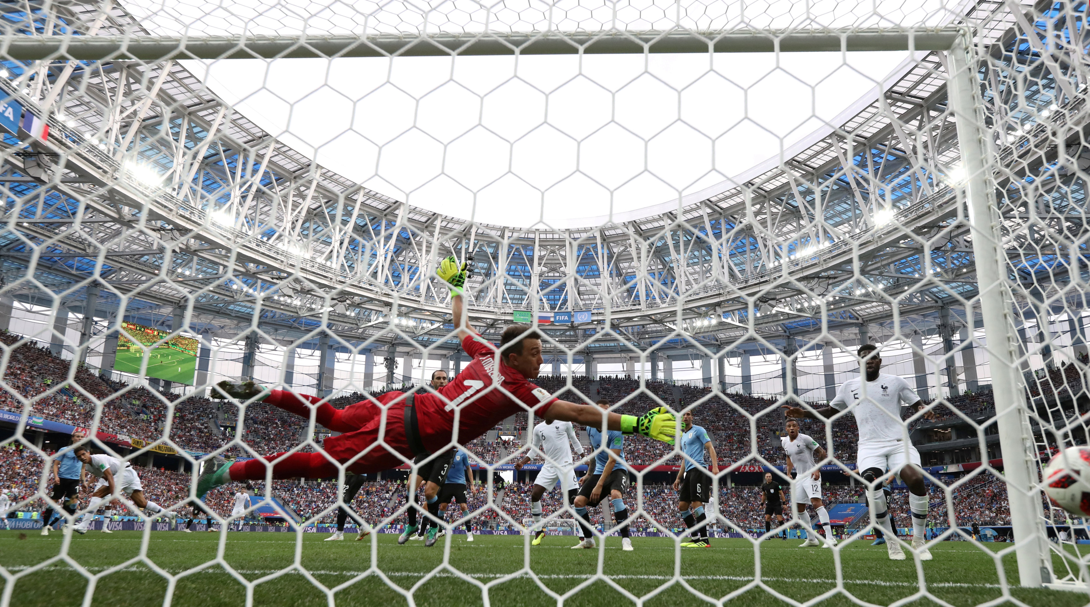 France's Raphael Varane scores their first goal. Photo: Reuters
