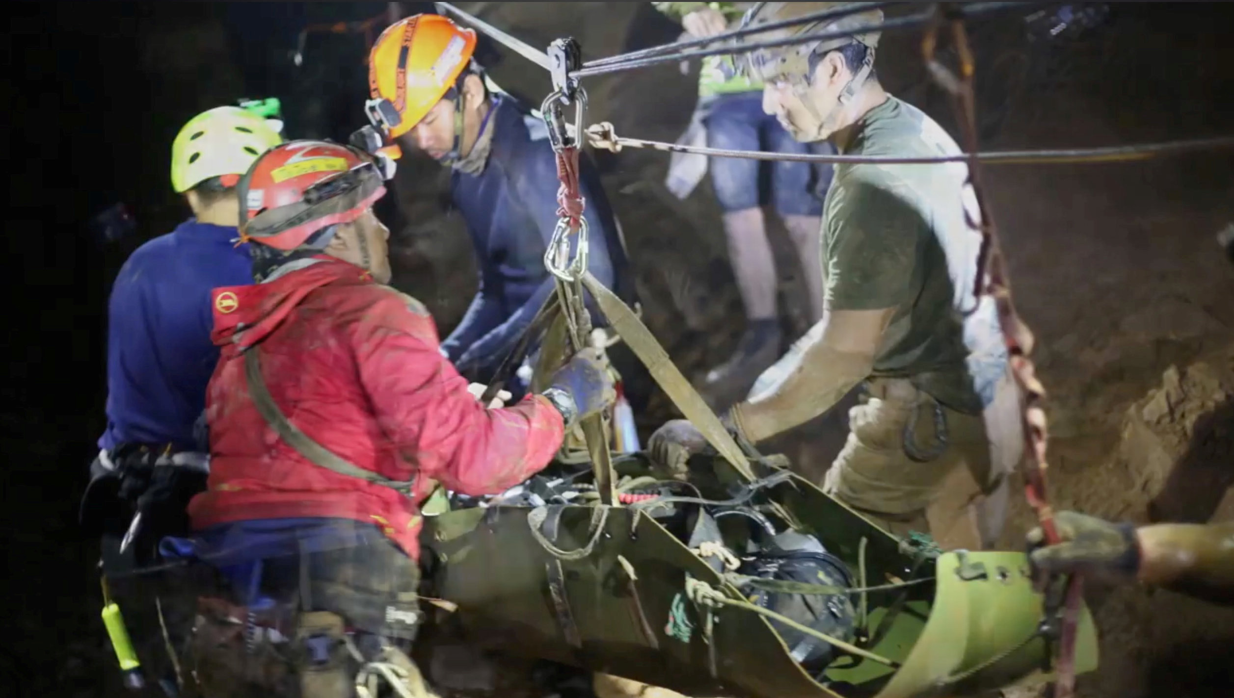 About 90 divers in all took part in the complex and dangerous rescue. Photo: Thai Navy Seal via...