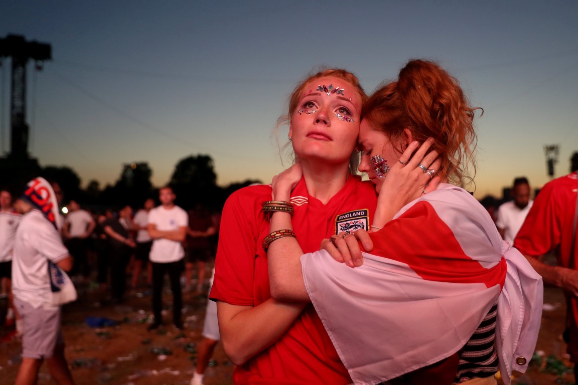England fans react after watching the match at an event in Hyde Park, London. Photo: Reuters
