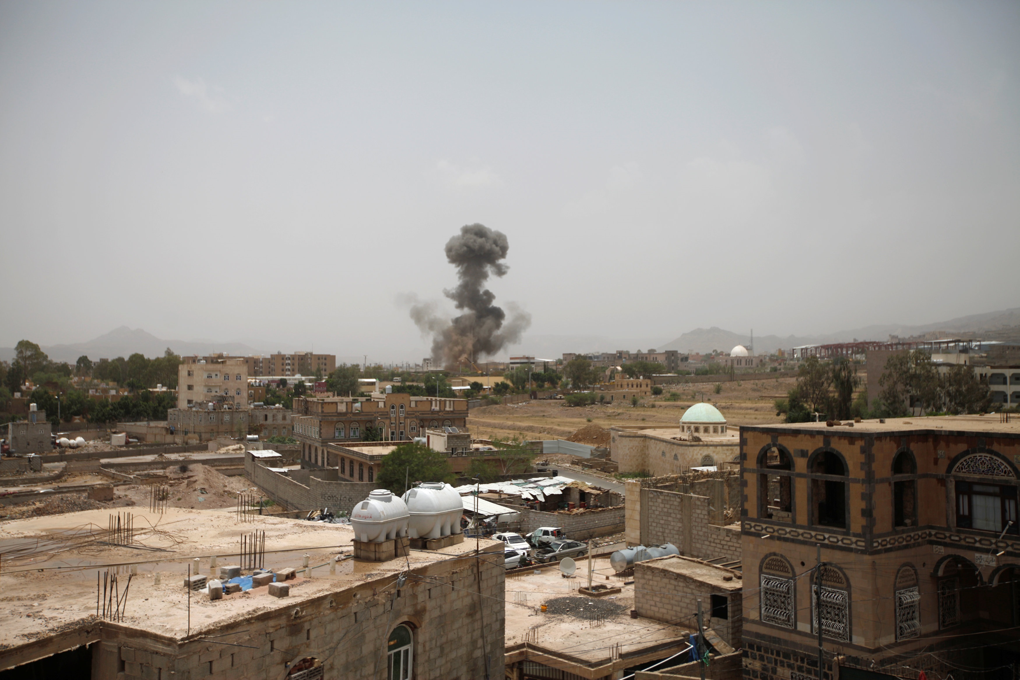 Smoke rises after an airstrike in Sanaa. Photo: Reuters 