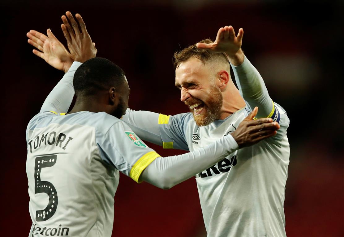 Derby County's Fikayo Tomori and Richard Keogh celebrate their victory. Photo: Reuters