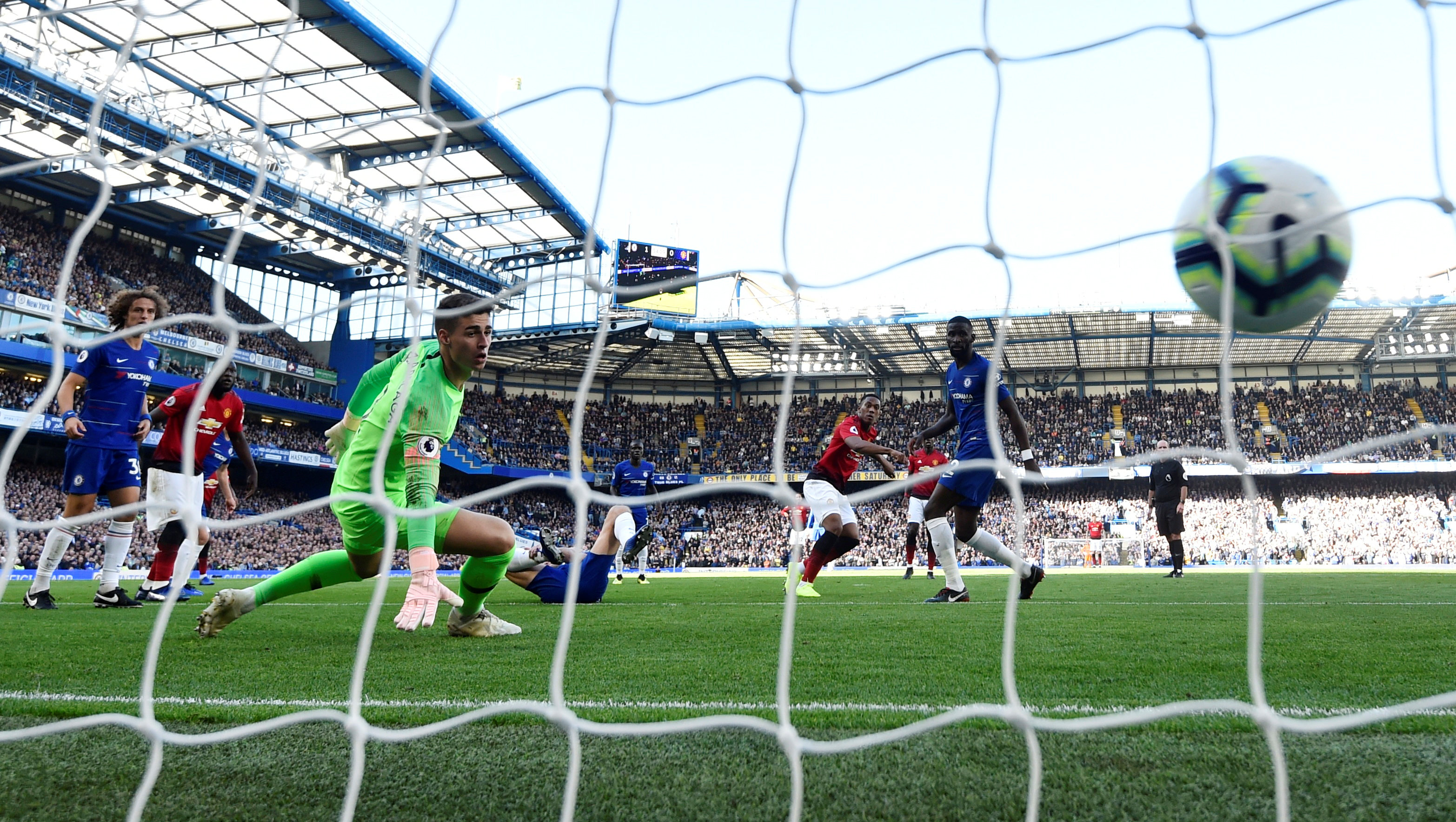 Manchester United's Anthony Martial scores their first goal against Chelsea at Stamford Bridge....