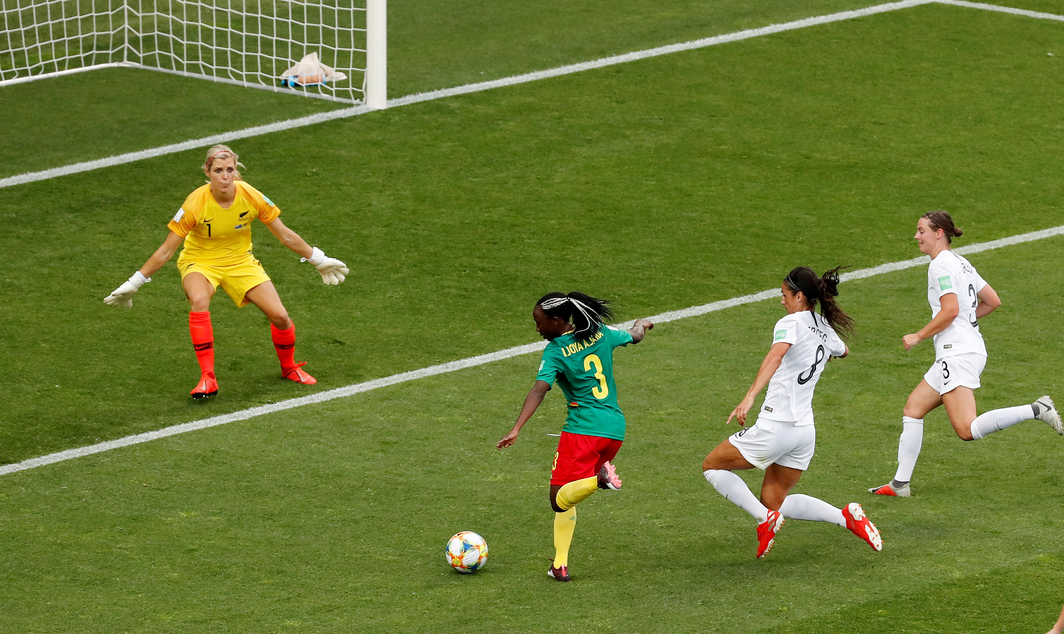 Cameroon's Ajara Nchout scoring their first goal. Photo: Reuters 
