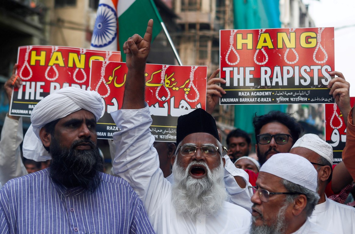 Demonstrators at a protest in Mumbai following the alleged rape and murder of the woman. Photo:...