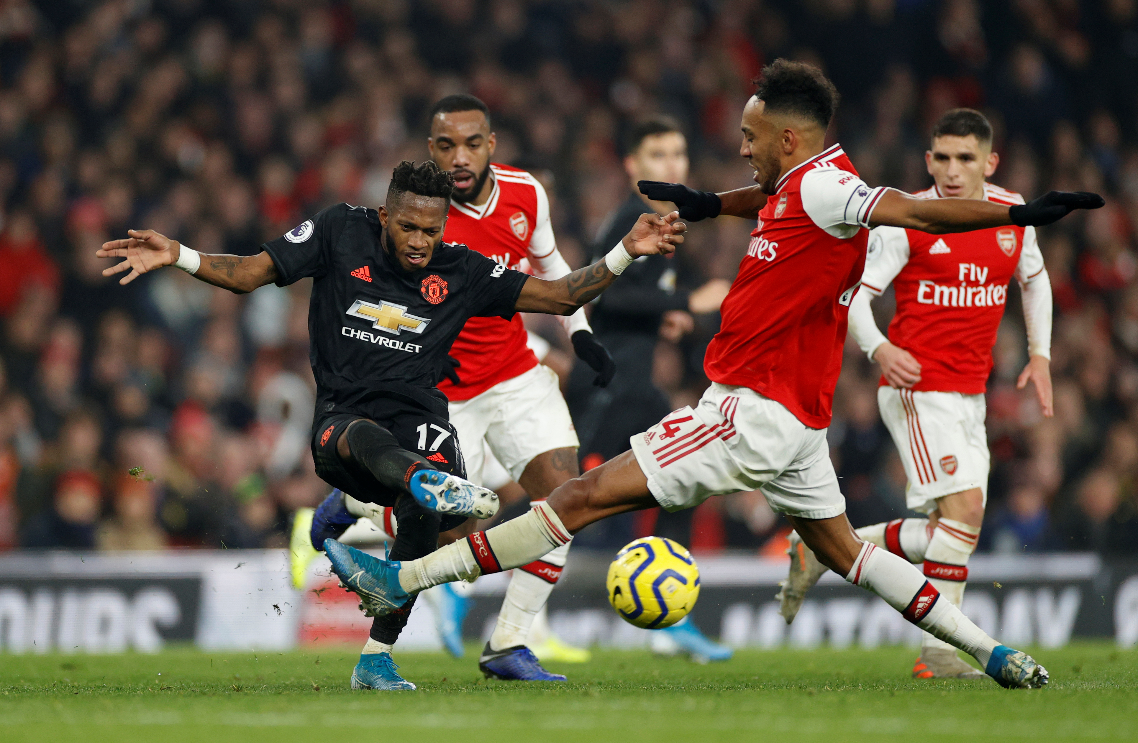 Manchester United's Fred in action with Arsenal's Pierre-Emerick Aubameyang. Photo: Action Images...