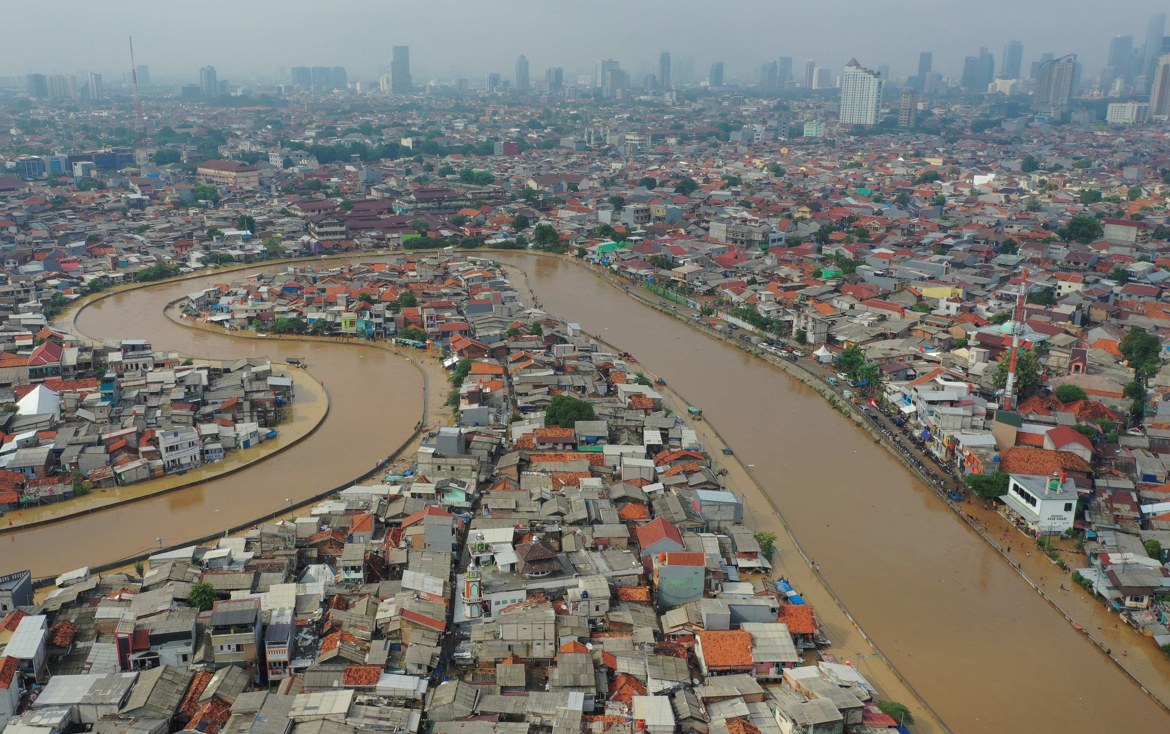 Swathes of Jakarta (pictured) and nearby towns have been inundated after heavy rain. Photo:...