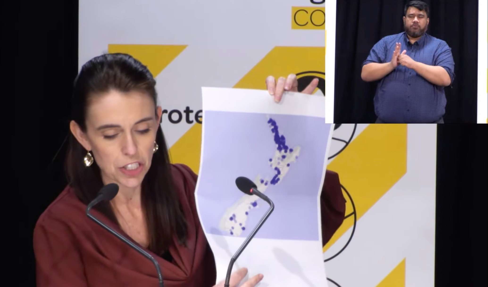 Prime Minister Jacinda Ardern displays a heat map showing the whereabouts of Covid contacts while...
