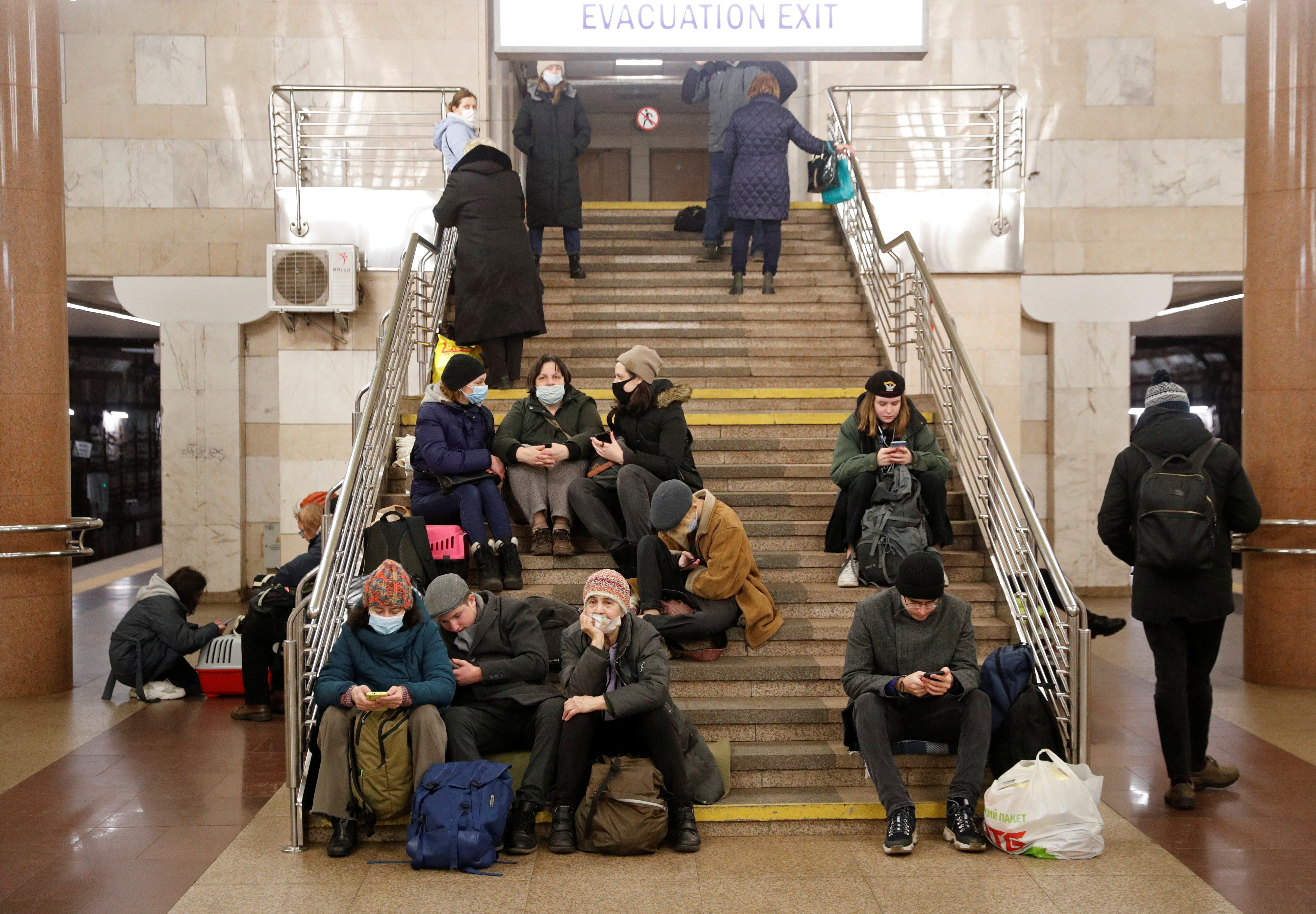 People take shelter in a subway station in Kyiv, after Russian President Vladimir Putin authorized a military operation in eastern Ukraine. Photo: Reuters