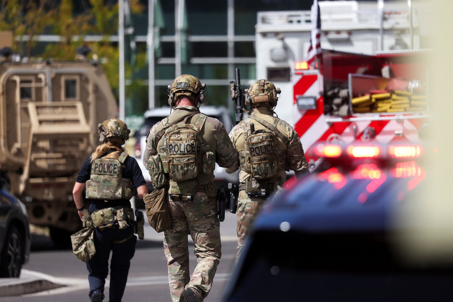 Police at the scene following the shooting. Photo: Reuters