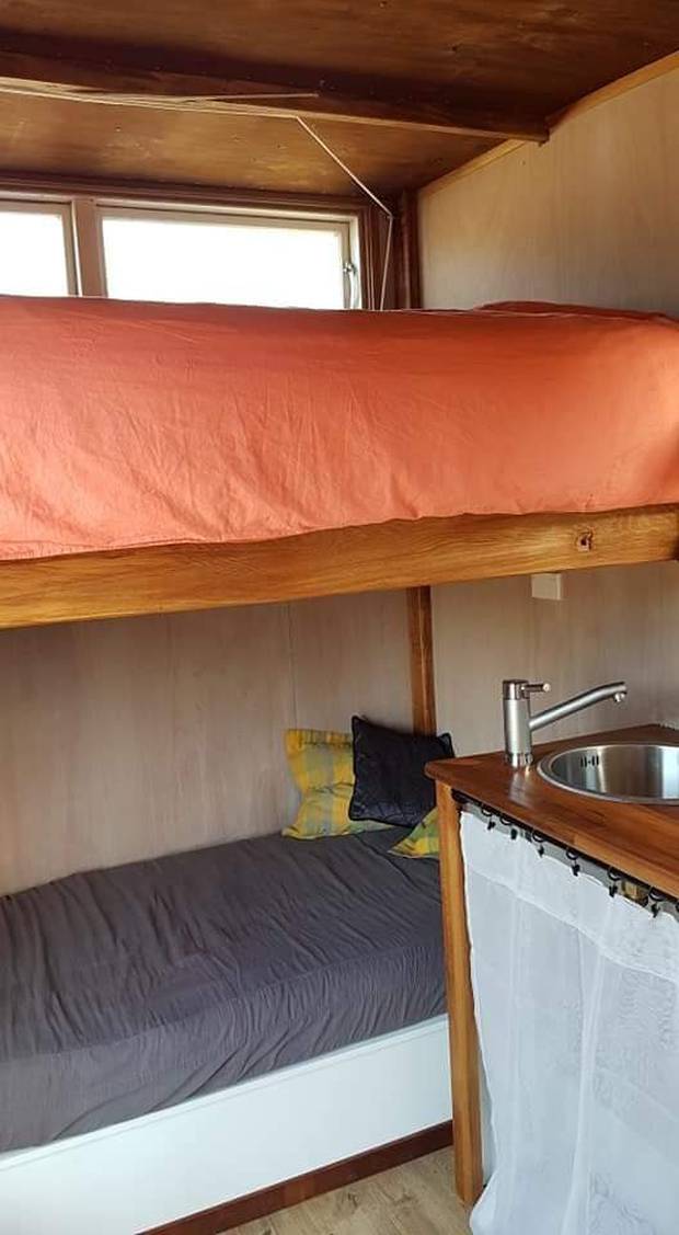 The tiny house fits a double and a single bed. Photo: supplied