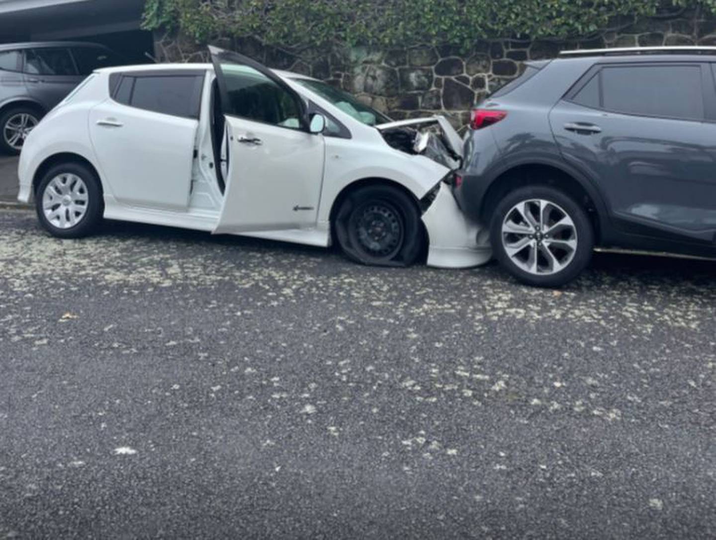 One of several cars damaged in the car chase in Devonport this morning. Photo: Lara Franks