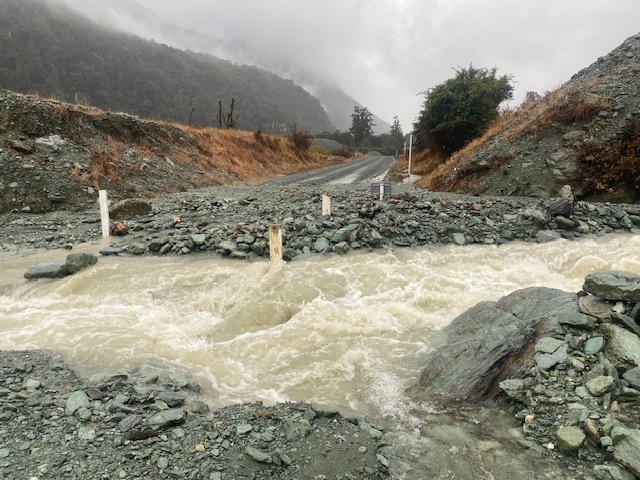 Flooding on Lower Hollyford Rd yesterday. Photo: EMS