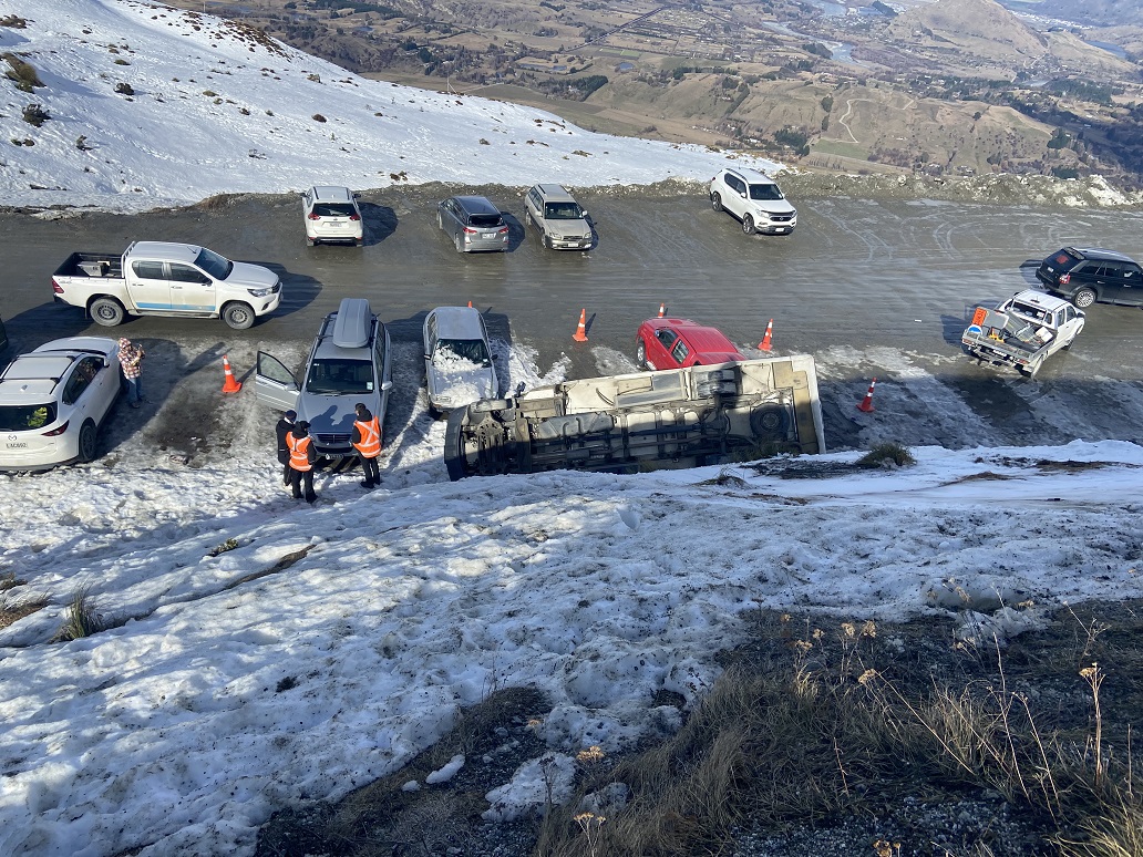 A campervan was blown over and rolled down a bank at the Coronet Peak car park. Other vehicles...