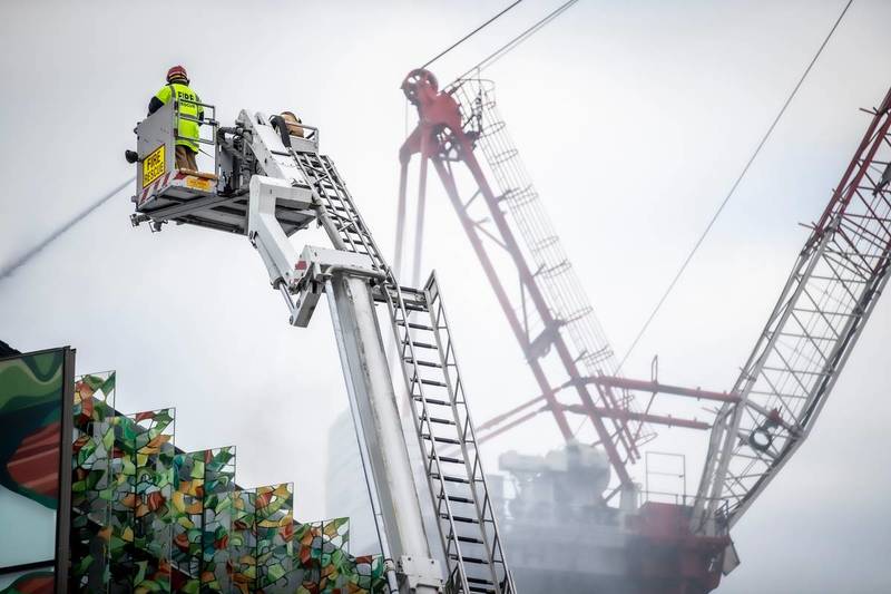 Fire crews are continuing to dampen down hotspots on Thursday. Photo: NZ Herald