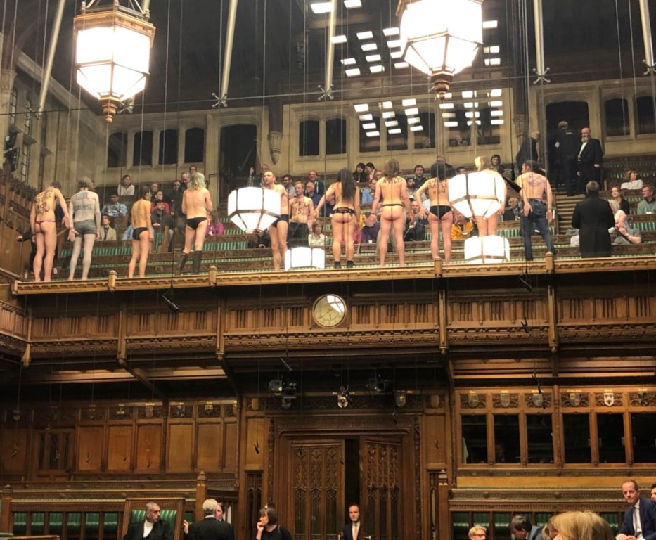 Demonstrators protest in the public gallery in the House of Commons in London. Photo: James...