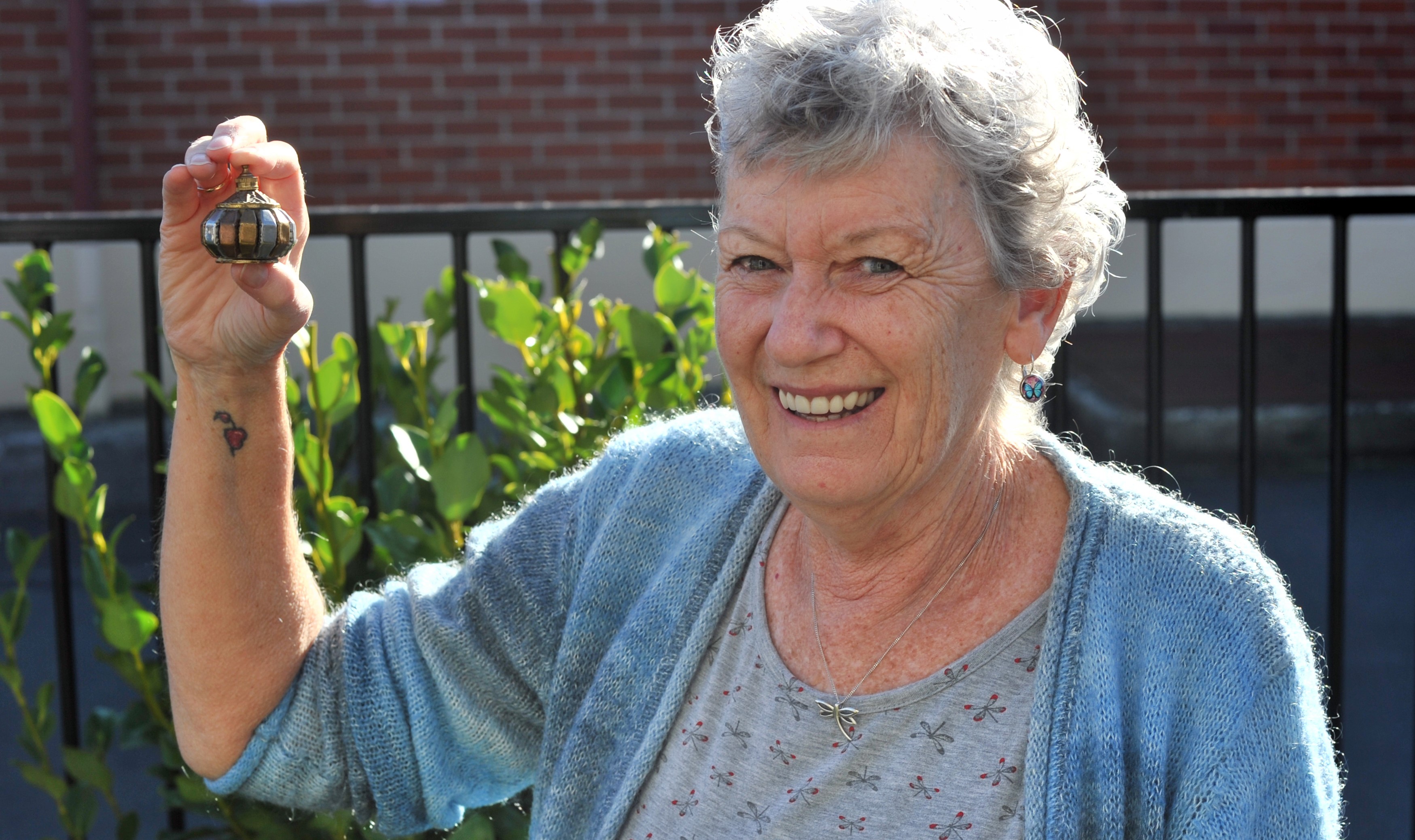 A relieved Ngairena Hibbs with the small urn on Saturday. Photo: Christine O'Connor