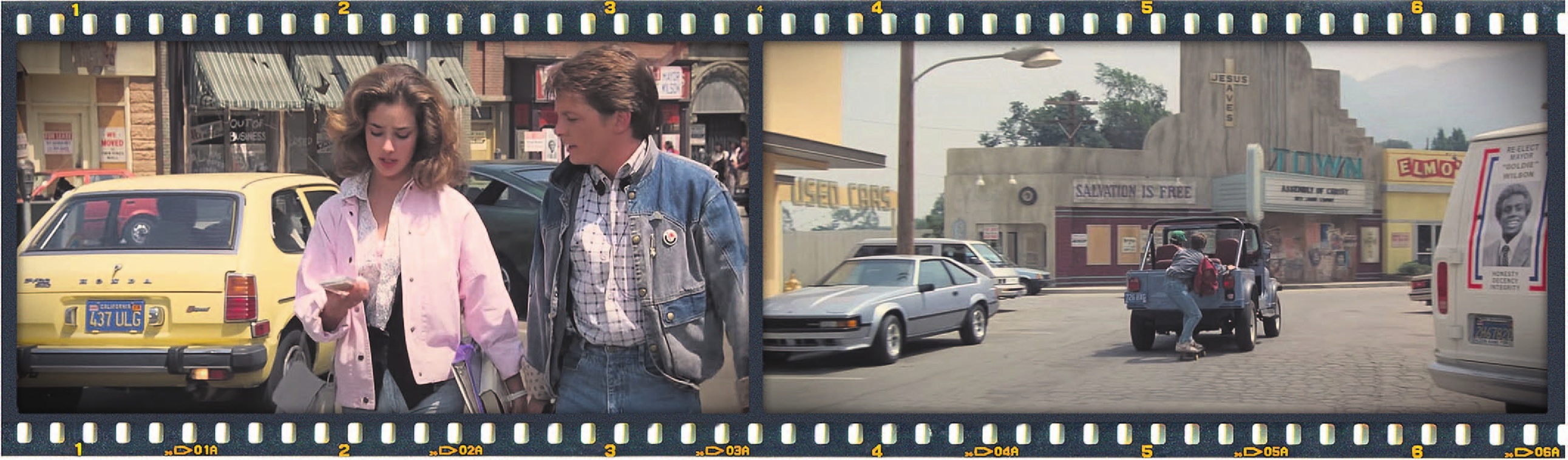 The focus is on Marty McFly and Jennifer Parker, but in the background the shop awnings are...