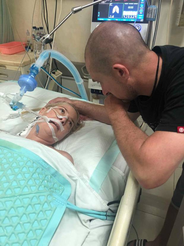 Abby Hartley with her husband Richard at hospital in Bali. Photo: Supplied