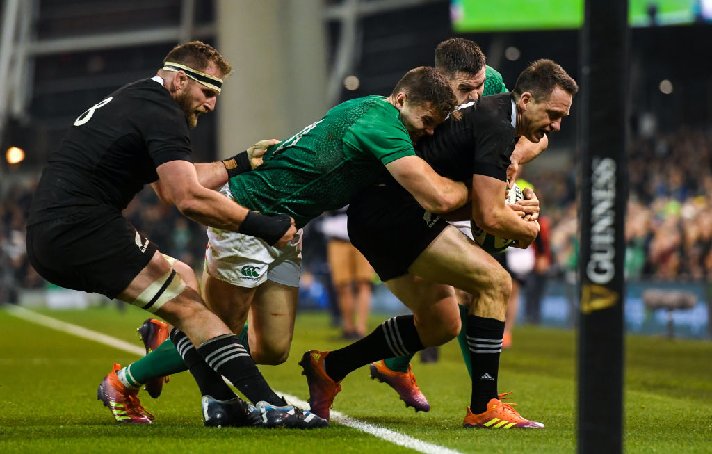 All Black Ben Smith is forced into touch by IJonathan Sexton and Jacob Stockdale despite the...