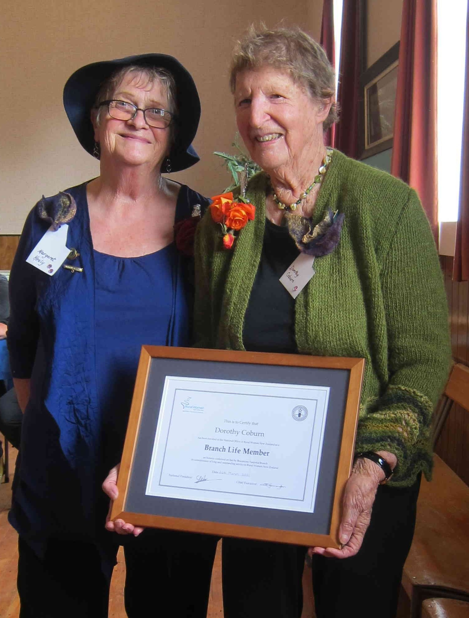 Beaumont-Tuapeka Rural Women convener Margaret Healy (left) presents a branch life membership to...