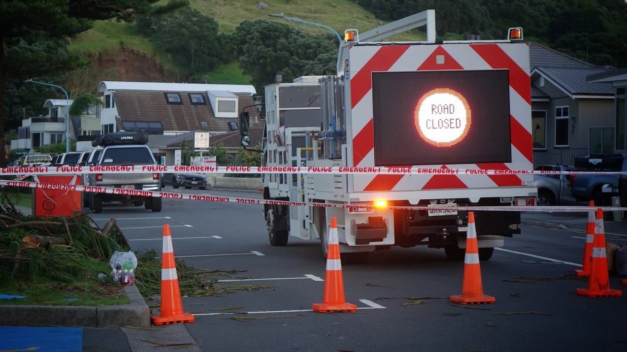The cordon at Mount Maunganui Beachside Holiday Park on Friday, with the slip visible in the...