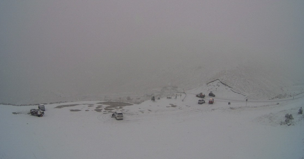 Snow began to settle on the summit of the Crown Range from about 10am today and chains were...