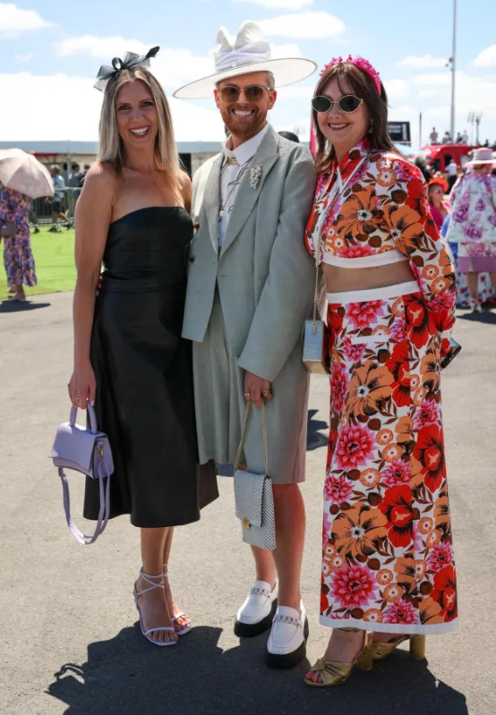 From left, Samantha Giles, Zane Tate and Jen Howell. Jen's wearing Aussie designer Alice McCall....