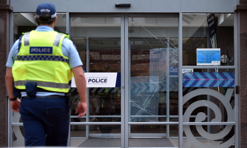 A broken window at the entrance of the Dunedin Police Station on Monday. Photo: Peter McIntosh