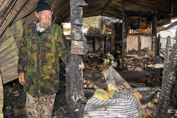 John Hill went to visit his friend in Birdlings Flat and found flames coming from his house on...