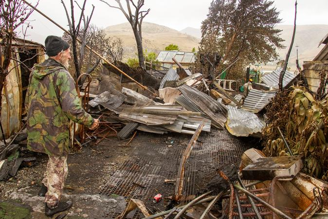 John Hill at the Lake Terrace Rd house. PHOTO: GEOFF SLOAN