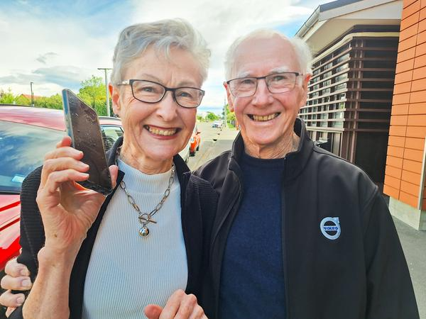It’s working! Zalda and Ralph Keall with the retrieved cellphone. PHOTO: BARRY CLARKE