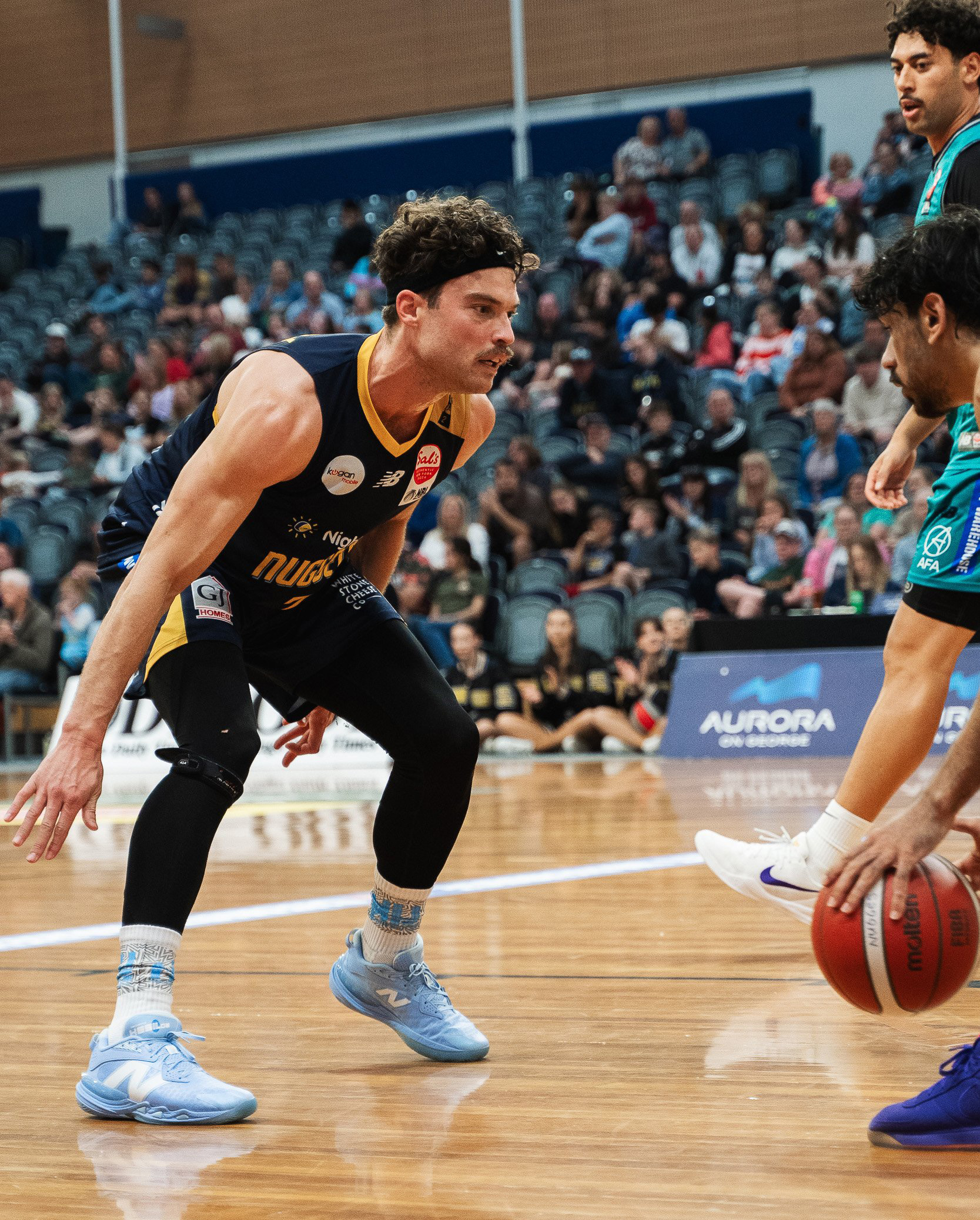 Otago Nuggets hustler Matthew Bardsley guards an Auckland Tuatara player during an NBL match in...