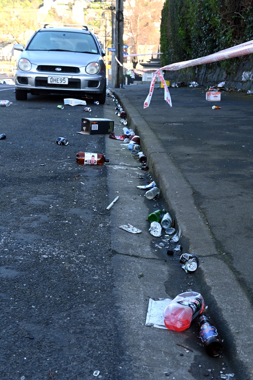 Debris was strewn on the street after the party. Photo: Linda Robertson