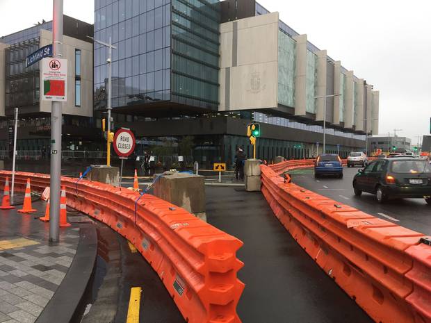 Roads are closed around the Christchurch Law Courts, and there's a heavy police presence at the...