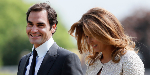 Tennis player Roger Federer and his wife Mirka arrive at St Mark's Church in Englefield, England,...