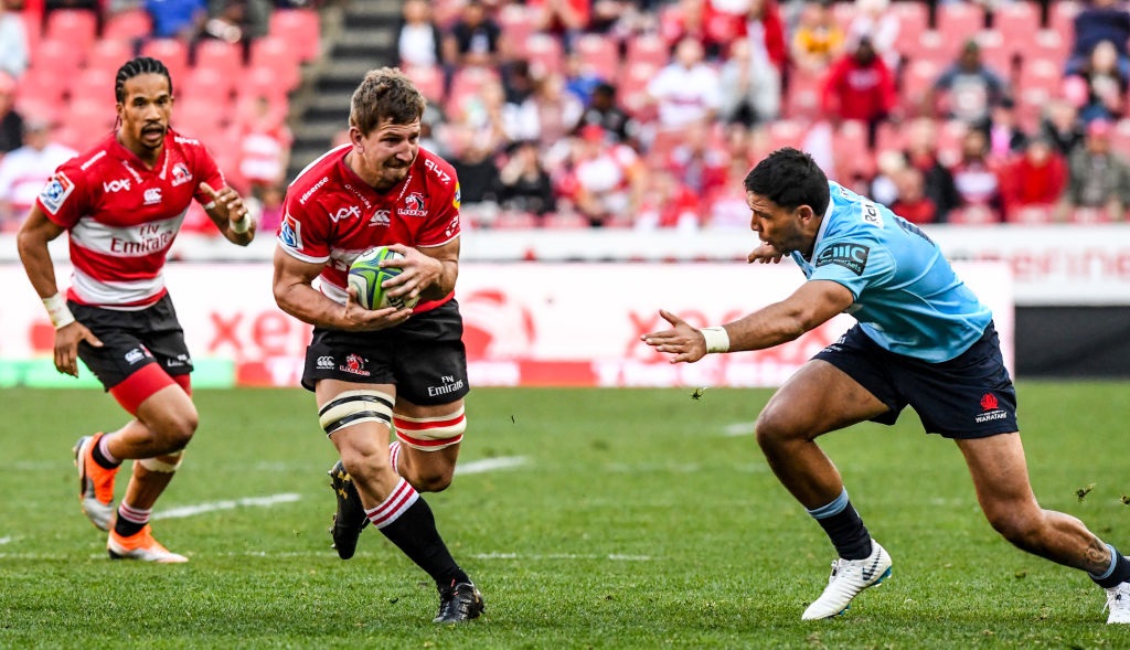 Kwagga Smith (centre) scored twice for the Lions against the Waratahs. Photo: Getty Images