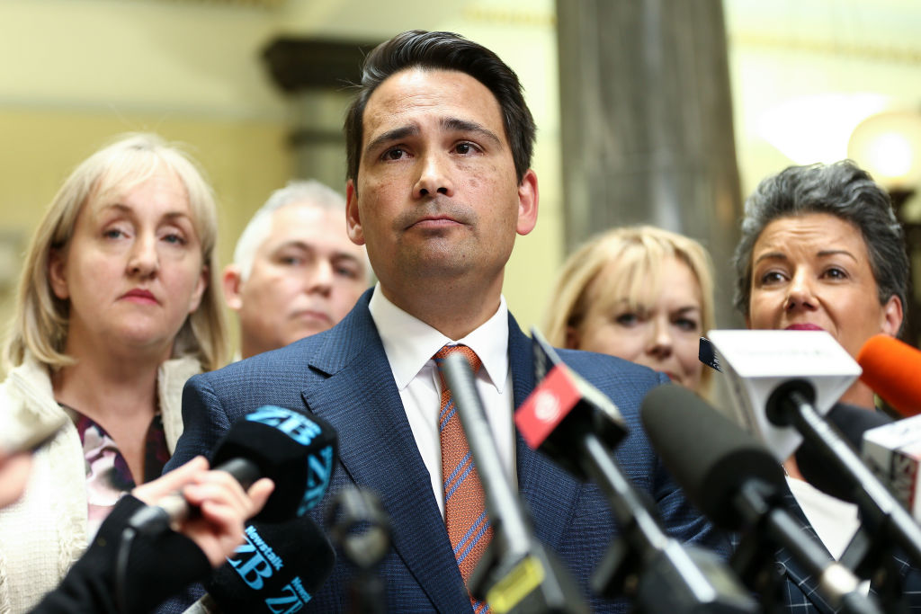 Flanked by MPs (from left) Amy Adams, Mark Mitchell, Judith Collins and deputy leader Paula...