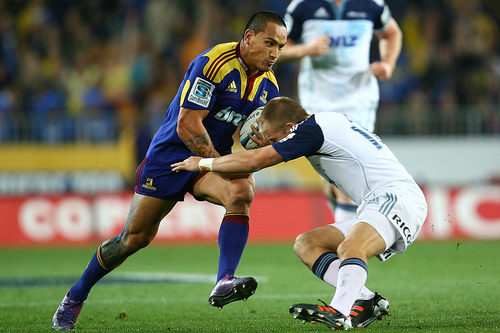 Hosea Gear runs over Gareth Anscombe during his devastating display which sparked a Highlanders...