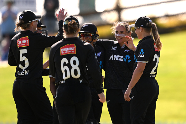 Amelia Kerr (second from right) celebrates with the White Ferns after taking a hattrick during...