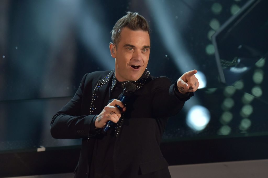 Robbie Williams performs at the Sanremo Music Festival in Italy earlier this year. Photo Getty