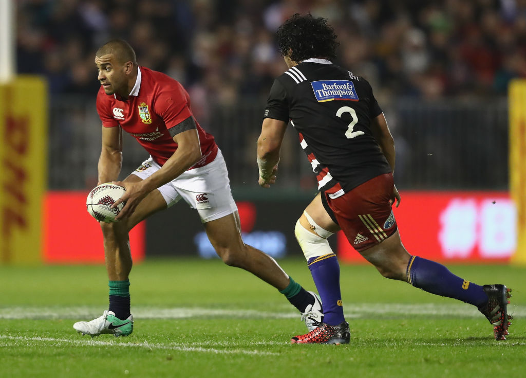 Sam Anderson-Heather (R) tries to run down Jonathan Joseph during the Barbarians v Lions match in...