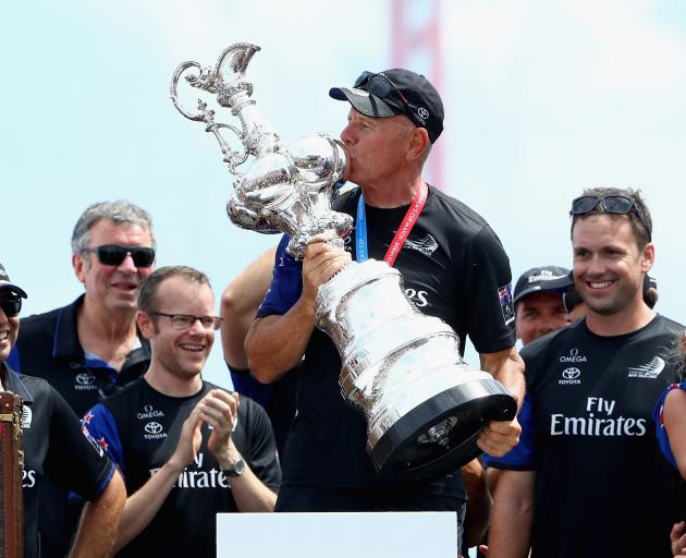 Team New Zealand boss Grant Dalton (centre) with the 'Auld Mug'. Photo: Getty Images 