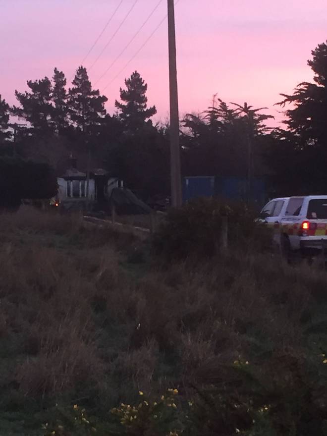 Fire investigators at the scene of the potentially fatal house fire last night. Photo: Amber Allott